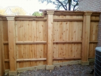 Step and level custom cedar fence solution