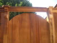 Arched gate with header