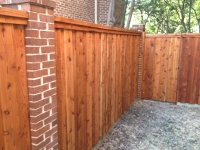 Cedar fence brick columns